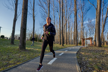 Young woman running in the park