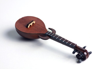 detail of rebab, arabic musical instrument, isolated on white background. Flat lay