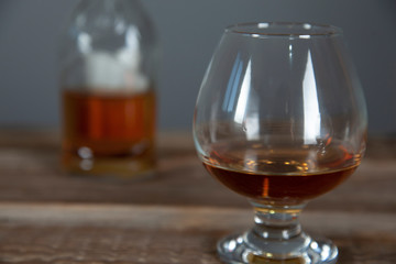 brandy with glass and cinnamon