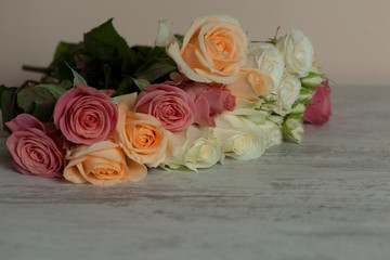 bouquet of natural flowers of a rose on a white background