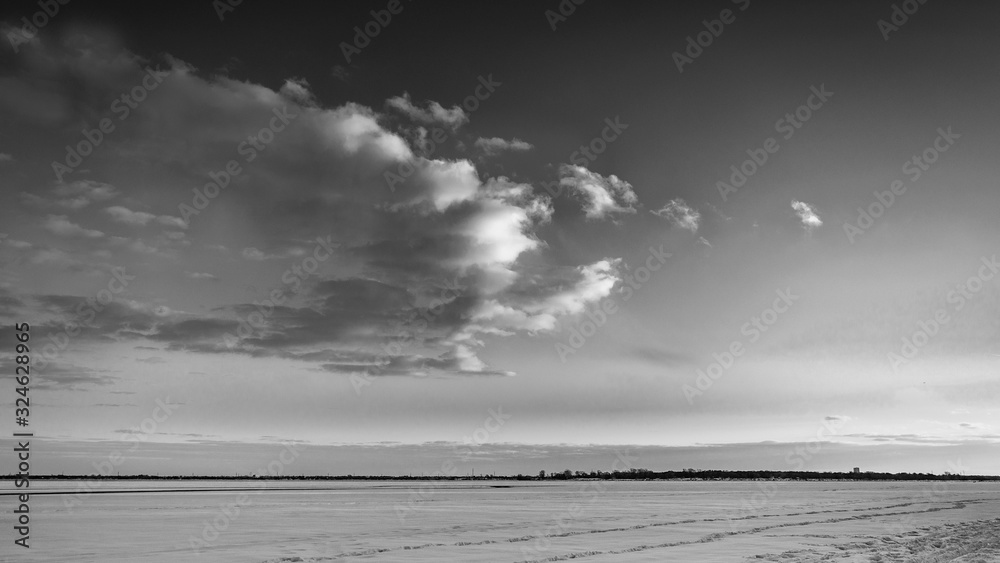 Wall mural landscape of a sky with clouds. dark clouds and snow