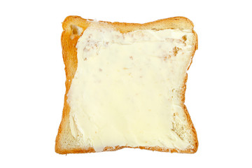 Slice of toast with butter Isolated on a white background. Closeup toast with buttered, top view. Toast with butter isolated on white. One slice of lightly toasted white bread. Sliced toast bread.