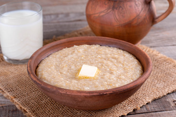Obraz na płótnie Canvas Wheat porridge with butter