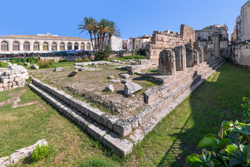 Wide angle view of the ruins of the temple of Apollo in Syracuse in a sunny summer day