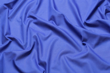 Blue fabric cloth texture. abstract texture background with soft waves.