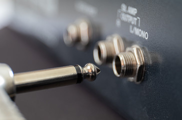 Jack plug and socket for electric guitar
