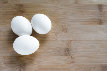 chicken egg on a dark background. food supply. concept of ingredients for cooking eggs