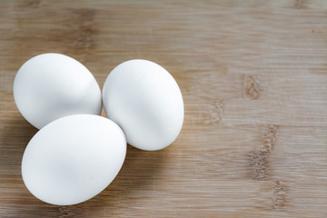 chicken egg on a dark background. food supply. concept of ingredients for cooking eggs