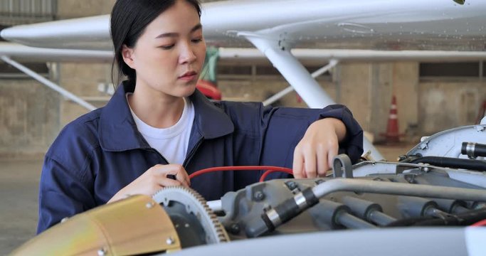 The technician planning and performs the aircraft repair inside the aircraft collector.