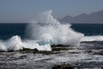 Big waves crashing on the rocks