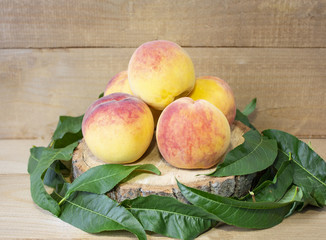 Ripe peaches on a white background. Peaches on a wooden background. Macro Banner View from above....
