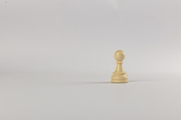 White single pawn figure isolated on white background