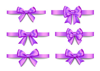Purple  gift bows set  for  Christmas, New Year decoration.