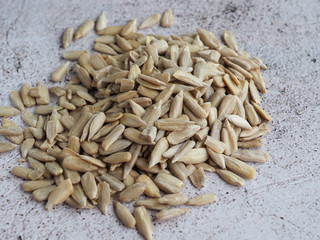 sunflower seeds on wooden background