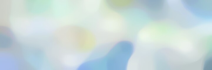 unfocused bokeh landscape format background graphic with light gray, sky blue and pastel blue colors space for text or image