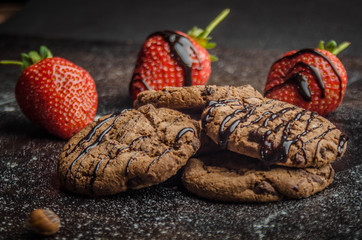 Tasty chocolate cookie dessert with fresh strawberries