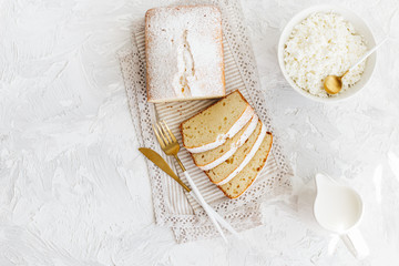 Homemade cottage cheese cake on gray white textured background, country rustic style