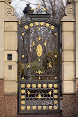 Forged decorative elements on a fence close up