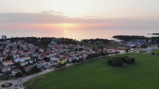 Beautiful seaside town Umag and sea at evening time with sunset and nice view.