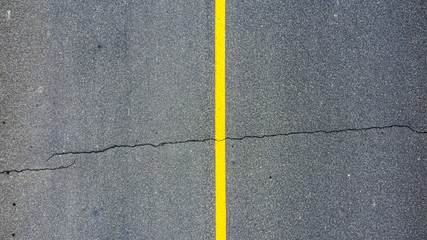Fototapeta premium texture of asphalt with one big crack.