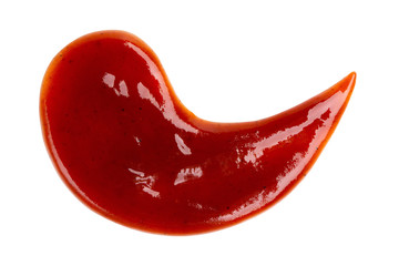 Drop of barbecue sauce or ketchup isolated on white background, top view, close up.