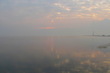 winter fog over the sea in the evening