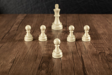 A white king and white pawns