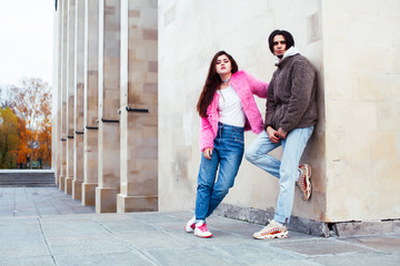 young happy students teenagers at university building on stairs, lifestyle people concept boy and girl