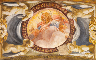 PARMA, ITALY - APRIL 15, 2018: The fresco of Jesus among the angels in church Chiesa di San Giovanni Evangelista by Correggio and his scholars (1524 - 1526)