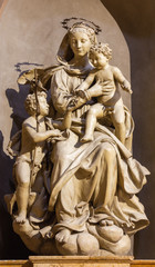 Fototapeta na wymiar PARMA, ITALY - APRIL 15, 2018: The carved statue of Madonna with the Child and St. John the Baptist in church Chiesa di San Giovanni Evangelista by Antonio Begarelli (1543).