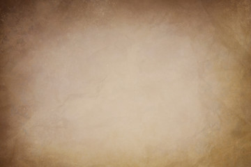 old crumpled paper with watercolor stains texture or background with dark vignette borders