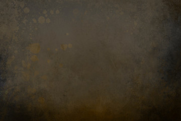 dark gray and golden background with splatters