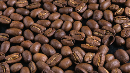 close-up, coffee grains on a black background