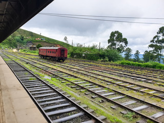 Photo of old broken railroad cart on the abandoned railway station