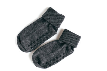 isolated black baby anti-slip socks on a white background