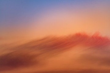 Abstract background with orange sky and red clouds. Travel destination Russia