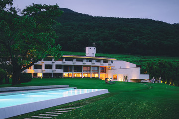 Fototapeta na wymiar Modern luxury hotel or villa building architecture and swimming pool