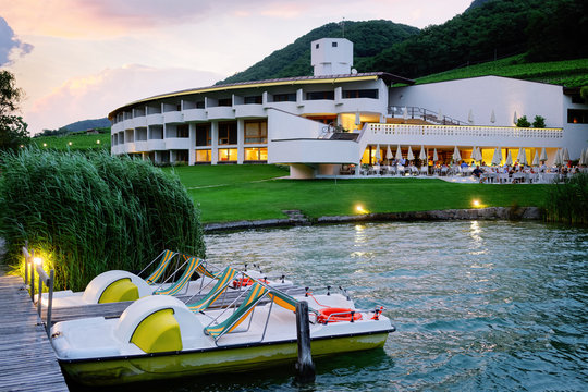 Modern luxury hotel or villa building architecture and landscape at evening