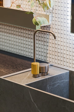 Bathroom interior grey marble sink and golden tap. Beautiful modern  bathroom design Stock Photo | Adobe Stock