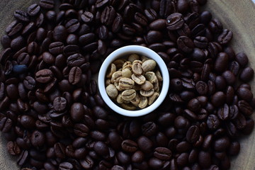  Dried beans and coffee beans from Colombia on wooden background