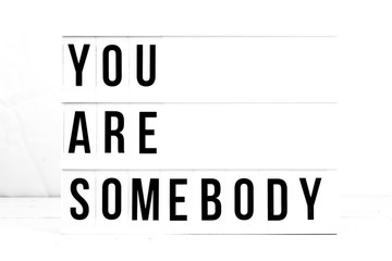 Mental Health. You Are Somebody quote on vintage retro board. Concept. flat lay