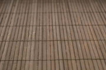 brown wood reed mat texture background with thread uniting