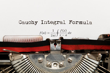Cauchy math integral formula written on paper with typewriter