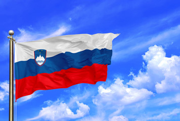Fototapeta na wymiar Slovenia White Red Blue National Flag Waving In The Wind On A Beautiful Summer Blue Sky