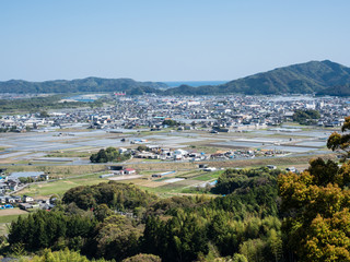 Fototapeta na wymiar View of Kochi city suburbs from the viewpoint at Kiyotakiji, temple number 35 of Shikoku pilgrimage - Kochi, Japan