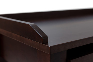 Retractable compact modern table made of wood.