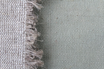 Canvas textile with fringe abstract gray texture background