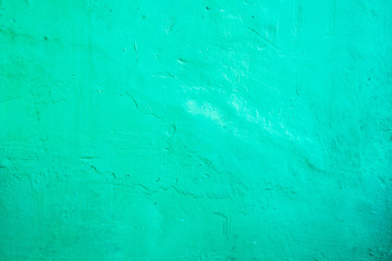 Rustic bright green concrete walls background. Aqua menthe color.
