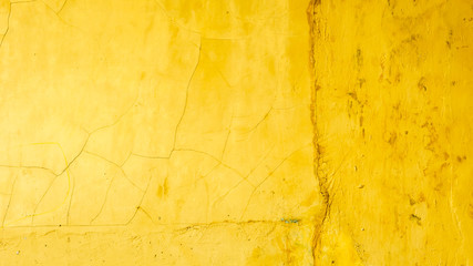 Rustic yellow concrete walls background. Vintage wall texture.