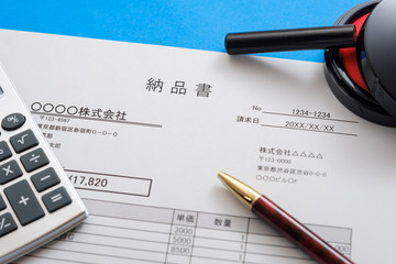 納品書　書類　イメージカット　ビジネスイメージ